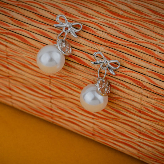 Pearl Bow Studs